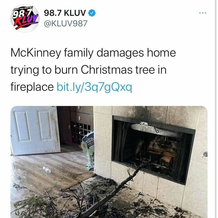 Tweet from 98.7 Kluv about a family damaging their home by trying to burn a Christmas tree in the fireplace, an unhinged news headline.