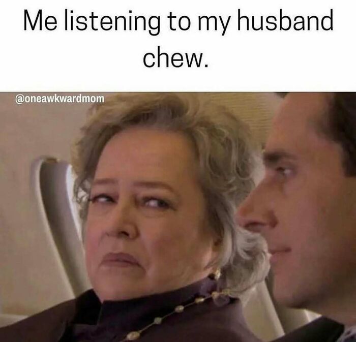 Woman giving a side-eye look sitting next to her husband, capturing a funny and chaotic marriage meme moment.