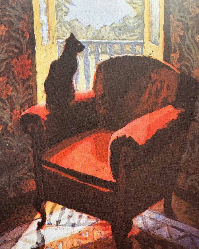 Painting of a cat sitting on an armchair by an open window, showcasing cats as a favorite art subject over the years.