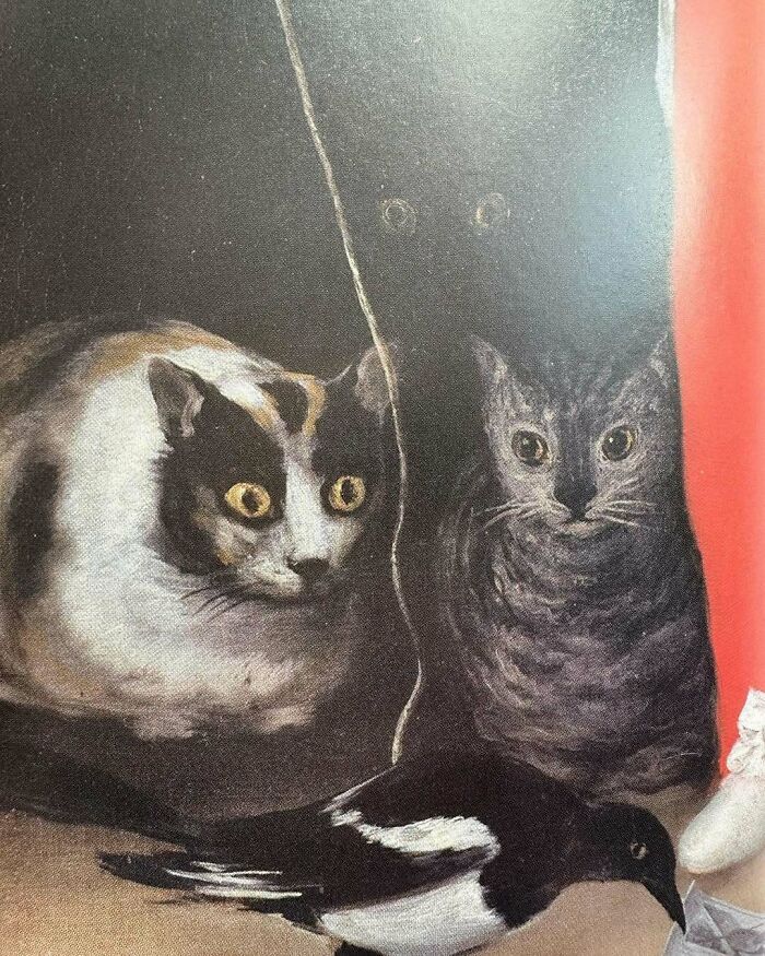 Two painted cats with focused expressions watching a bird, highlighting paintings of cats as favorite art subjects.