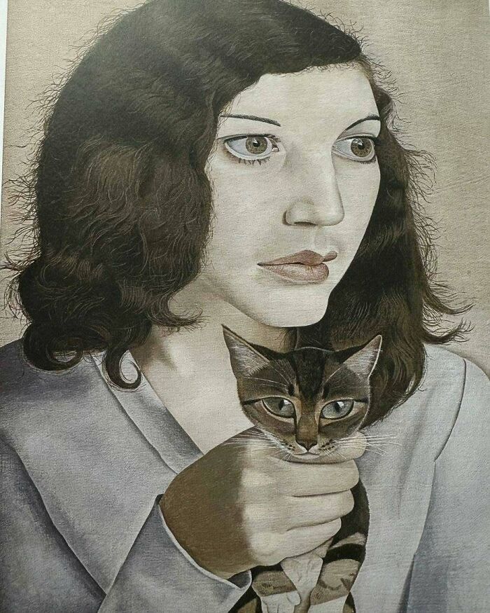 Painting of a woman with dark hair holding a tabby cat, showcasing cats as a favorite art subject throughout the years.