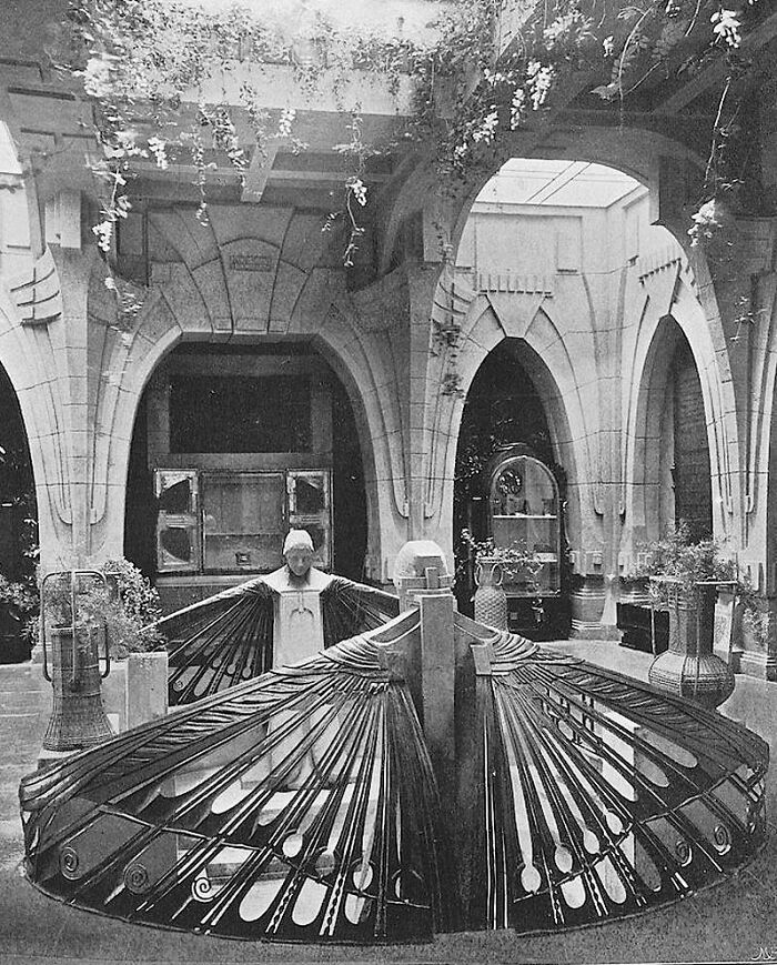 Intricate architectural structure with soaring arches and decorative ironwork showcasing human creativity.