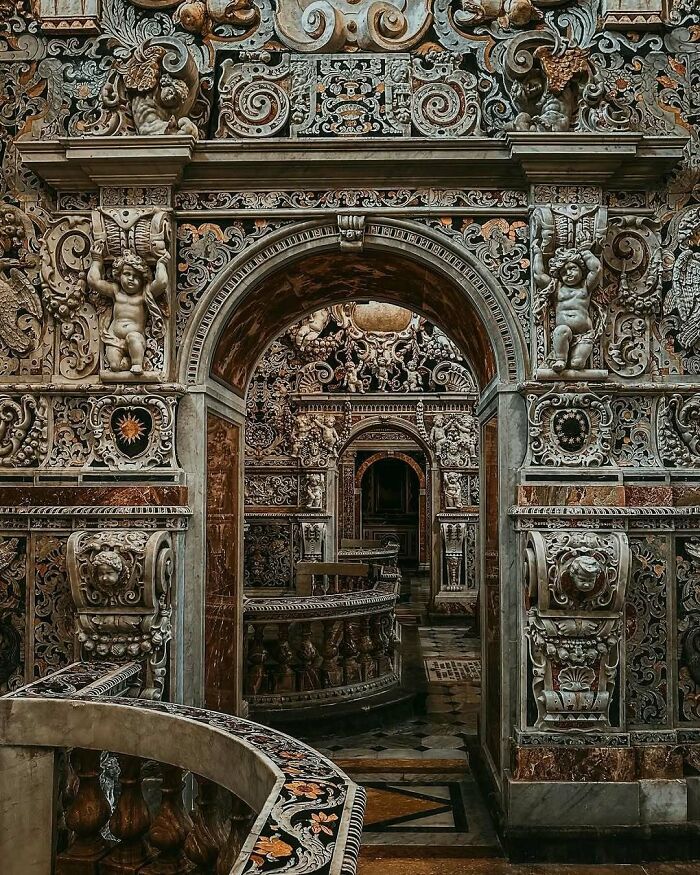 Intricately carved architectural structure featuring detailed stonework and artistic designs showcasing human creativity.