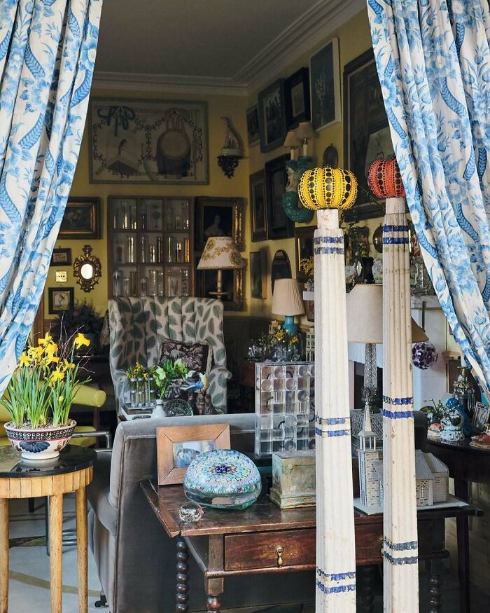 Bold and beautiful interiors featuring eclectic decor, patterned curtains, vintage furnishings, and artistic accessories.