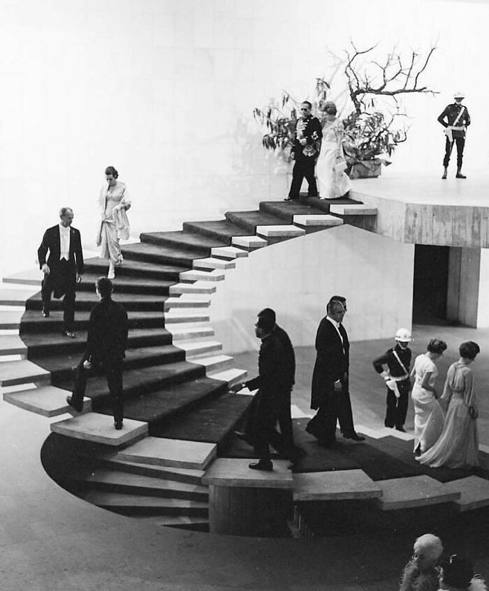 Spiral architectural structure with people walking, showcasing beautiful and amazing creativity in architecture.