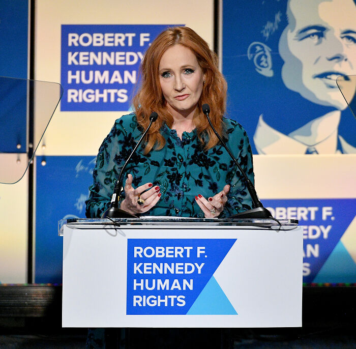 Author JK Rowling speaking at a Robert F. Kennedy Human Rights event, linked to Harry Potter fans' reaction.