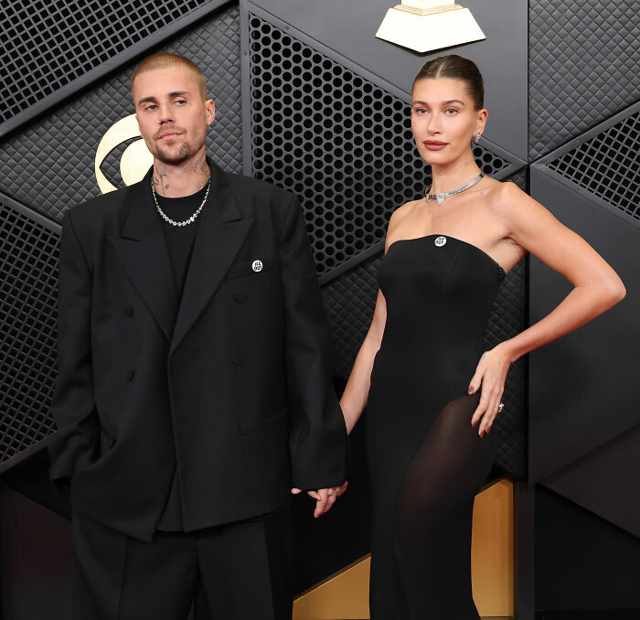 Justin Bieber and Hailey posing on the Grammys red carpet, fans react to Justin Bieber abandoning wife controversy.