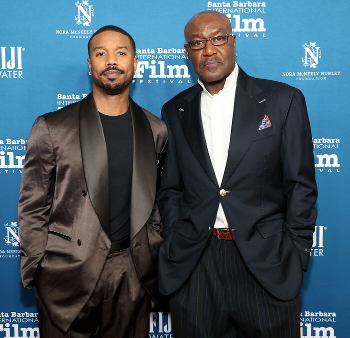 Michael B. Jordan and another man posing at Santa Barbara International Film Festival event.