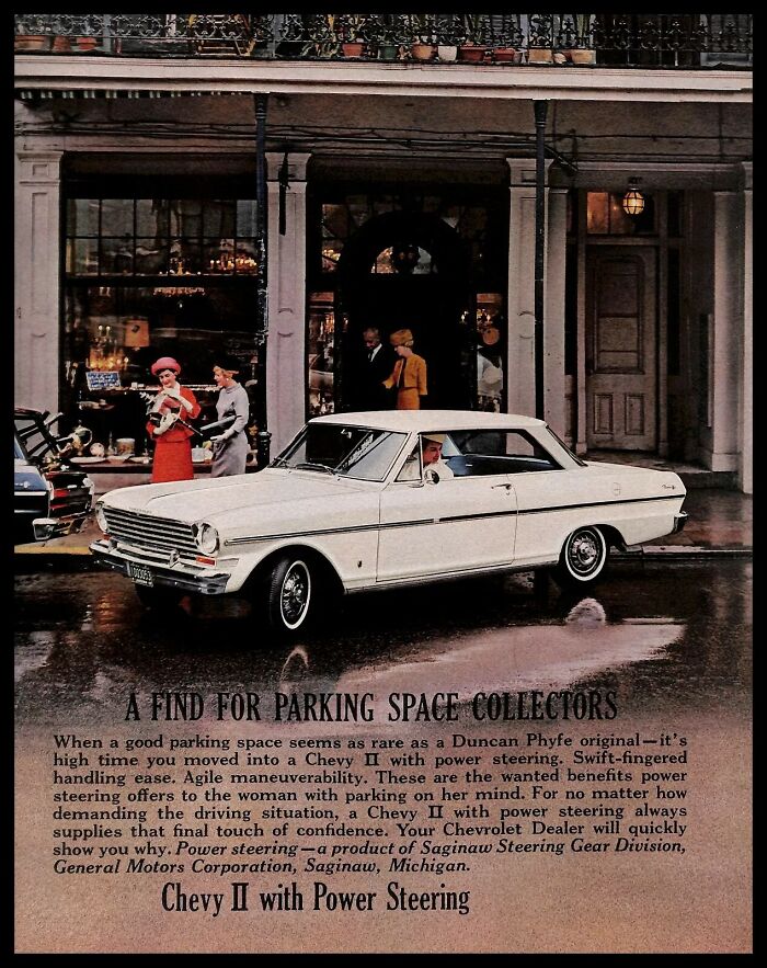 Vintage American ad showing a classic Chevy II car with power steering parked in front of a store with people nearby.
