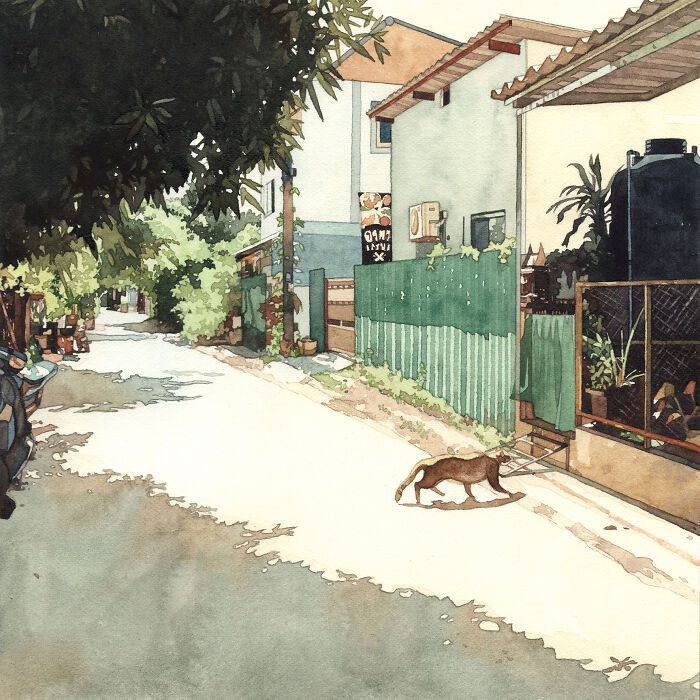 Watercolor painting of a quiet street with a brown cat walking along the sunlit sidewalk in a dreamy style.