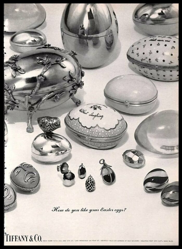 Vintage American ad featuring ornate decorative Easter egg jewelry boxes by Tiffany & Co. showcasing craftsmanship and design.