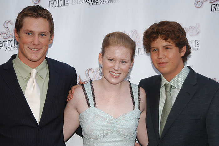 Three young adults posing at an event, related to Martin Short’s daughter Katherine and her surprising name change. Three young adults posing at an event, related to Martin Short’s daughter Katherine and her surprising name change.