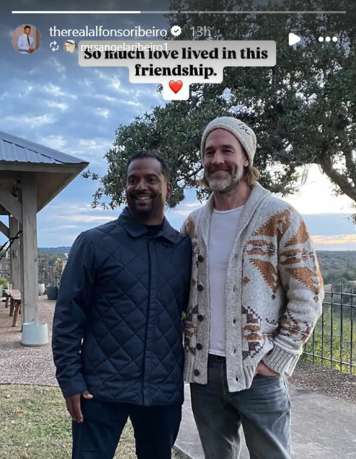 Alfonso Ribeiro and James Van Der Beek share a heartfelt moment outdoors with trees and sky in the background.