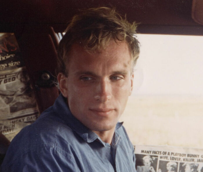 Peter Greene sitting in a car, looking contemplative, related to fans' reaction to his cause of passing.