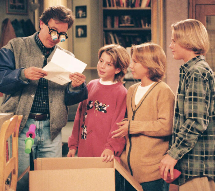 Home Improvement cast including Zachery Ty Bryan in a scene from the popular family sitcom.
