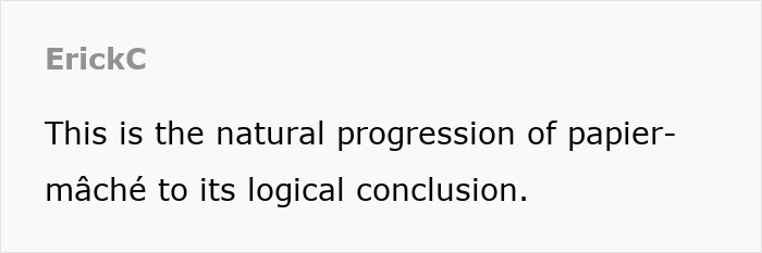 Guitar crafted using a 3D mold and stacks of newspapers, showcasing innovative papier-m&acirc;ch&eacute; design that actually rocks.