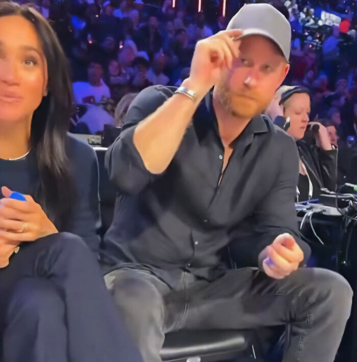 Prince Harry and Meghan Markle at NBA All-Star Game, showing body language that sparks fan theories and media attention. Prince Harry and Meghan Markle at NBA All-Star Game, showing body language that sparks fan theories and media attention.