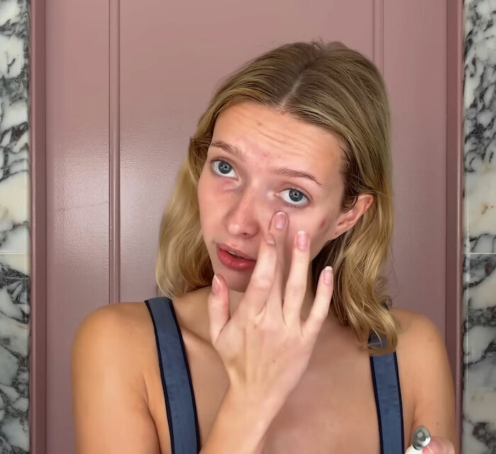 Apple Martin applying skincare in a bathroom, revealing cosmetic procedures she has had and discussing beauty treatments.