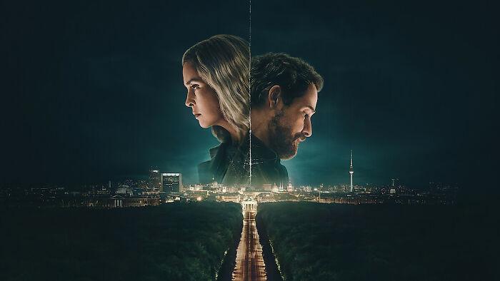 Two characters back to back above a cityscape at night, highlighting latest Netflix releases for weekend watching.