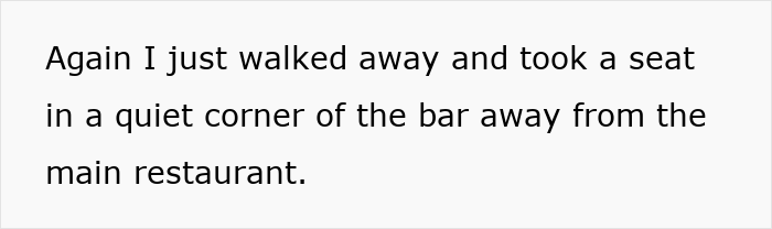 Text on white background stating a person walking away to sit quietly in a corner of a bar away from the main restaurant.