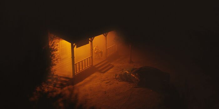 A mysterious glowing figure near a porch at night, evoking strange things people witnessed beyond Earth.