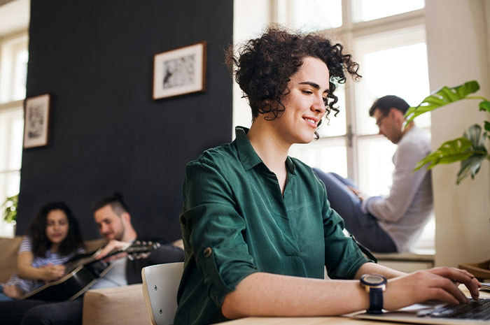 Young man refusing to pay for a hotel as he helps his roommate lie to her conservative family at home.