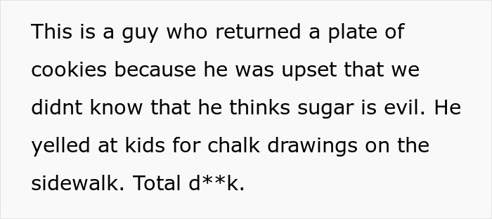 Man with snowblower making sure mean neighbor&rsquo;s driveway is the only one covered in snow on a cold winter day