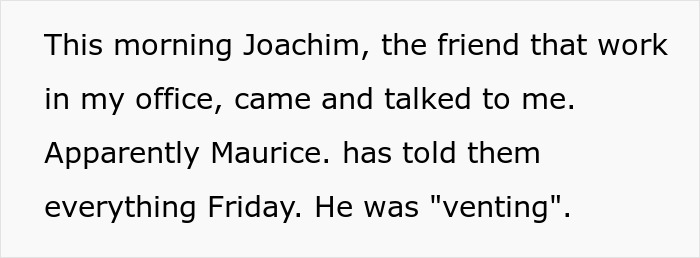 Man sitting at office desk talking seriously to a friend about husband best friend cheating situation.