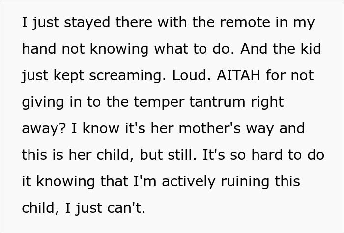 Person holding a remote, feeling conflicted about ignoring a 3-year-old&rsquo;s tantrum and toddler spoiling behavior.
