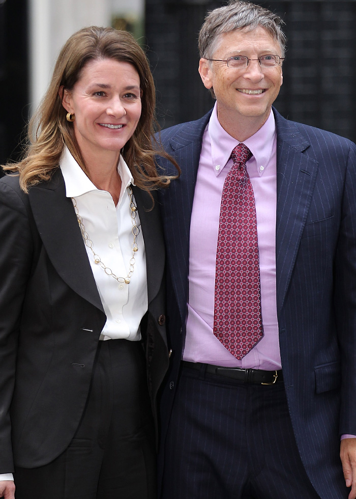 Bill Gates and Melinda smiling together outdoors, related to Epstein files alleging STD and antibiotic claims.