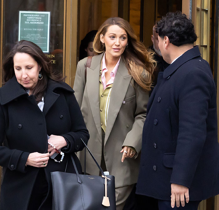 Blake Lively exiting court with entourage, showcasing world class privilege and sparking public outrage.