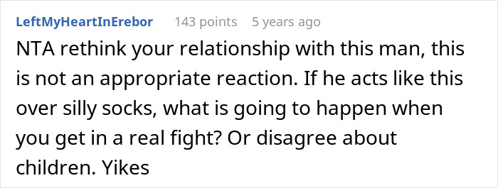 Screenshot of a comment advising a woman to reconsider her relationship after her boyfriend&rsquo;s extreme reaction to her fun sock collection.