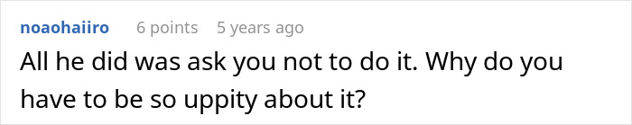 Man using a snowblower to intentionally leave one driveway covered in snow while clearing others on a snowy day