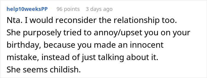 Screenshot of a Reddit comment discussing a woman upset her boyfriend likes the gift she gave him unexpectedly.
