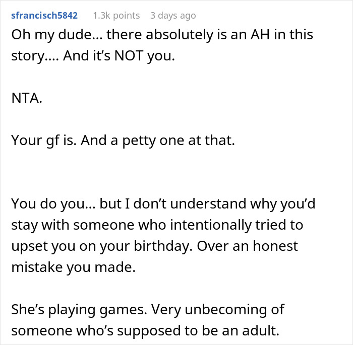 Reddit comment about woman upset boyfriend likes her gift, highlighting relationship issues and emotional games.