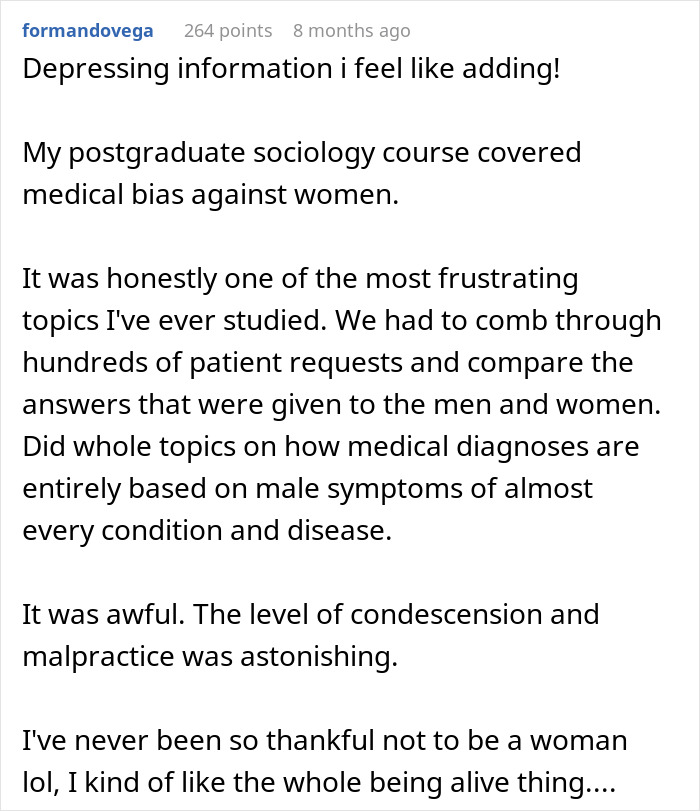 Lesbian couple expressing confusion and concern after discovering one partner is pregnant, sitting closely together indoors.