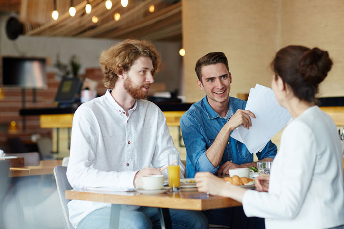 A nervous guy brings his bestie to chaperone his first date at a caf&eacute; while the lady looks visibly upset.