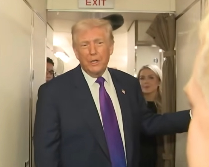 Former President Trump speaking inside a narrow airplane aisle as Elon Musk&rsquo;s daughter drops UFO files accusation.