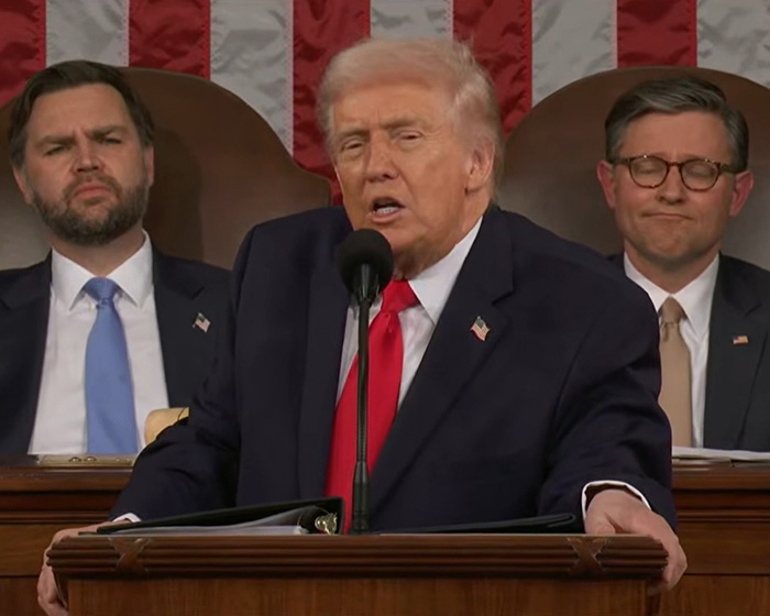 Donald Trump speaking at State of the Union with two men seated behind him, Erika Kirk goes viral mention context. Donald Trump speaking at State of the Union with two men seated behind him, Erika Kirk goes viral mention context.