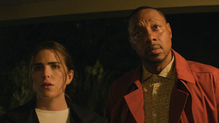 Two characters from 56 Days ending scene, showing emotions that highlight the show&rsquo;s changes to the book's climax.