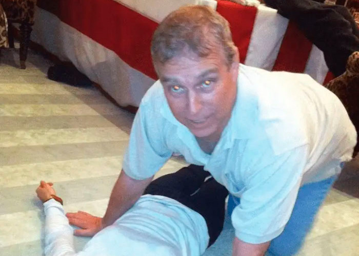 Prince Andrew on the floor with a terrified look, highlighting suffering after his arrest in a tense indoor setting.