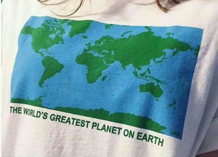 T-shirt with a world map graphic and text saying the world's greatest planet on earth, geography humor concept.