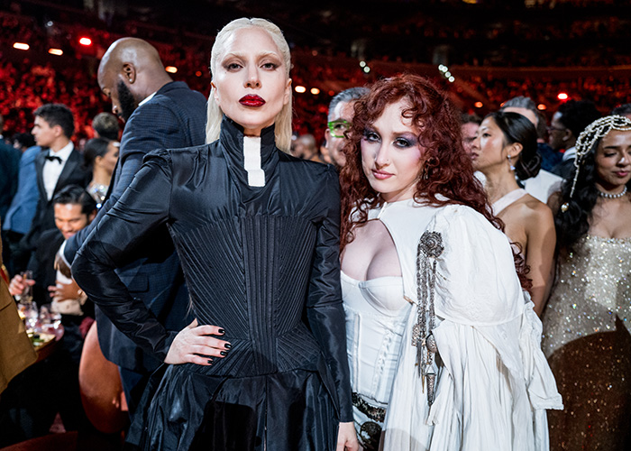 Two stylish attendees at the Grammy event highlighting the strict rules Grammy seatfillers face during the ceremony.