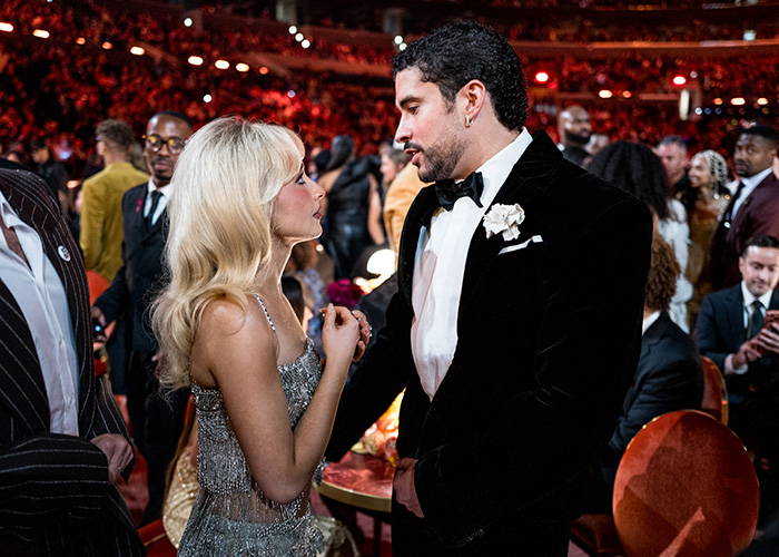 Couple dressed formally at the Grammy event, highlighting the Grammy seatfiller rules during the ceremony.