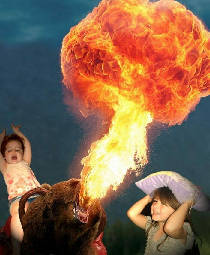 Bear breathing fire with children reacting in shock, an unhinged and wild pic people could not explain without Photoshop.