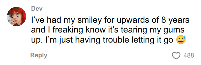 User comment expressing concern about dental pain from wearing a smiley piercing related to health experts' advice.