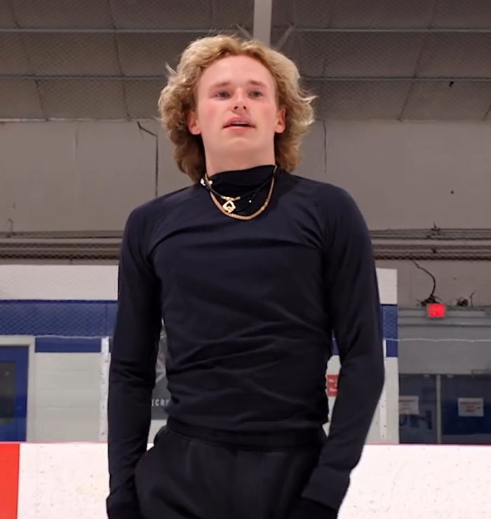 Ilia Malinin on ice in training gear with concern from fans after troubling posts following major defeat.