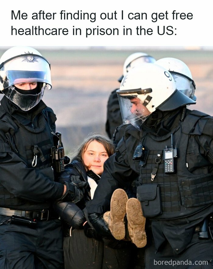 Woman being carried by police officers in riot gear, highlighting healthcare memes about US prison healthcare access.