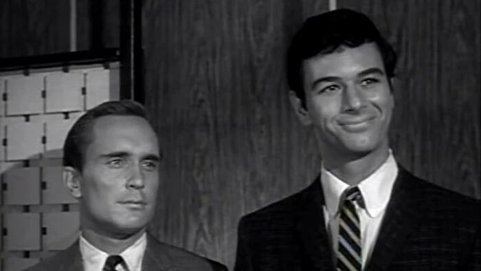 Robert Duvall in a classic black and white TV scene, showcasing one of his early memorable TV roles. Robert Duvall in a classic black and white TV scene, showcasing one of his early memorable TV roles.