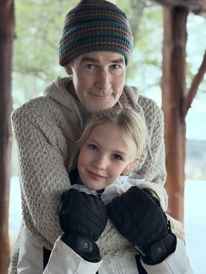 James Van Der Beek warmly embracing a young girl outdoors, highlighting emotions after his tragic passing.
